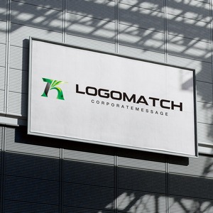 未来へ羽ばたくKと風のロゴ