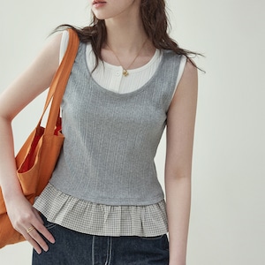 pieced together faux two piece sleeveless top