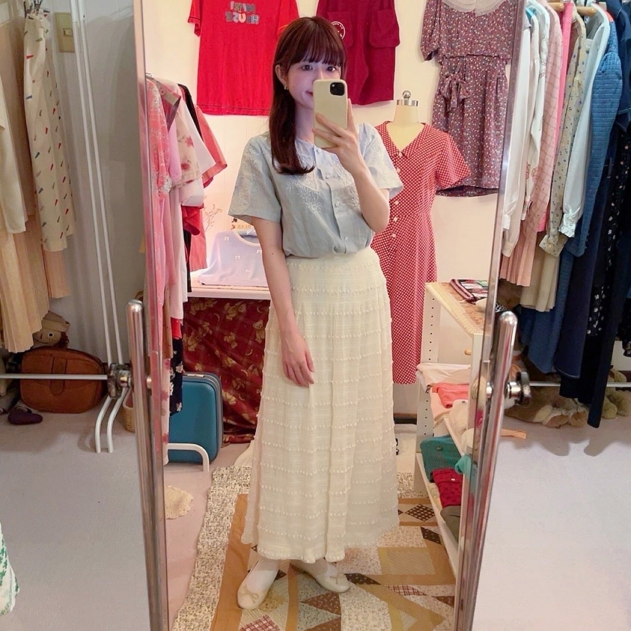 NINARICCI / mini ponpon white flare skirt
