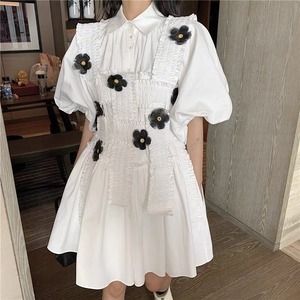 white shirt black flower dress