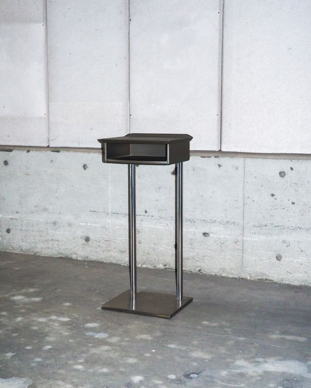 okamura stainless steel table with a shelf