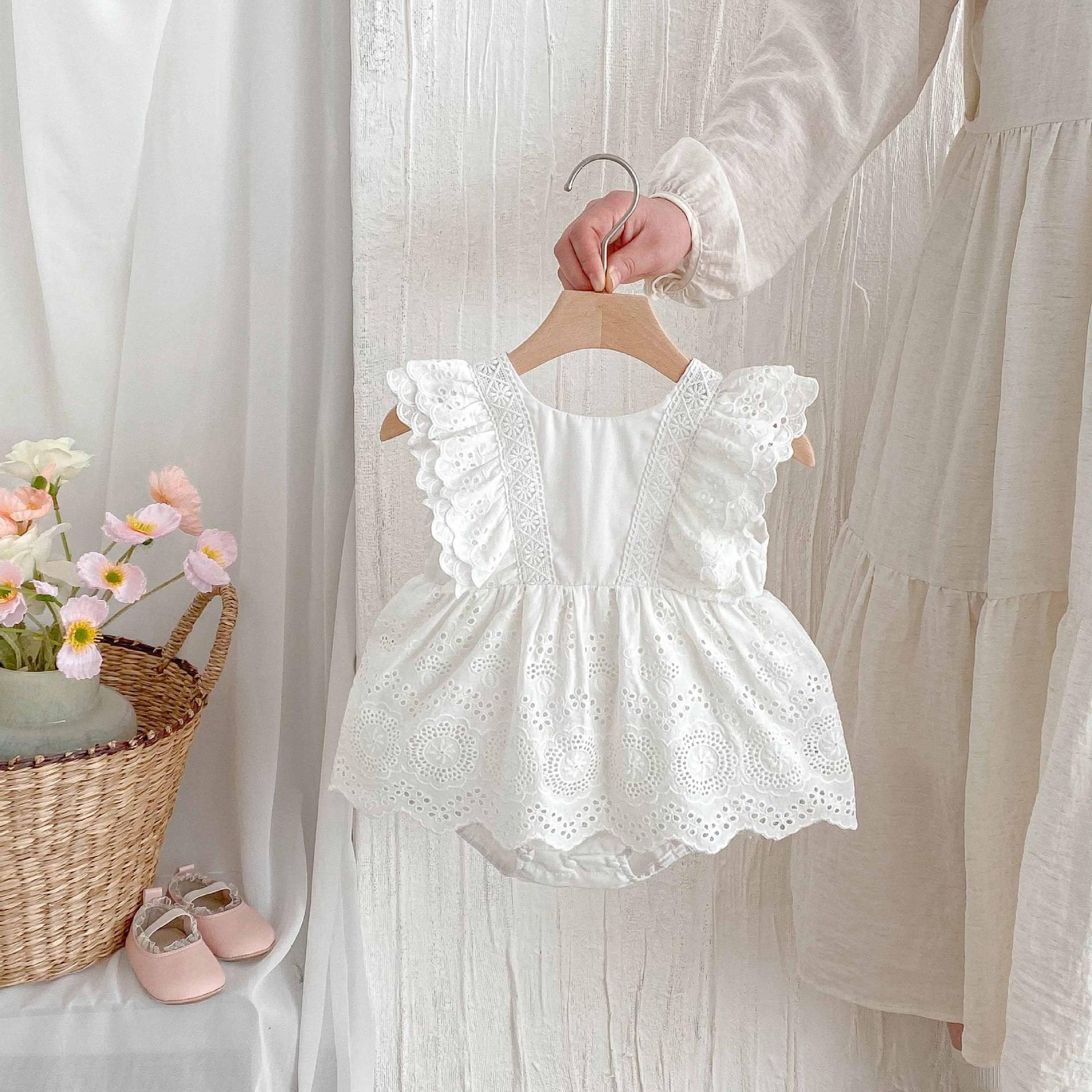 バックリボンオープンロンパース