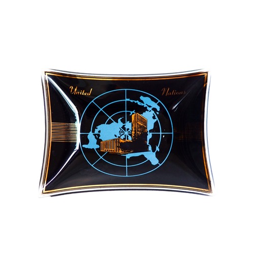 vintage tray from the United Nations made of smoky black glass tray