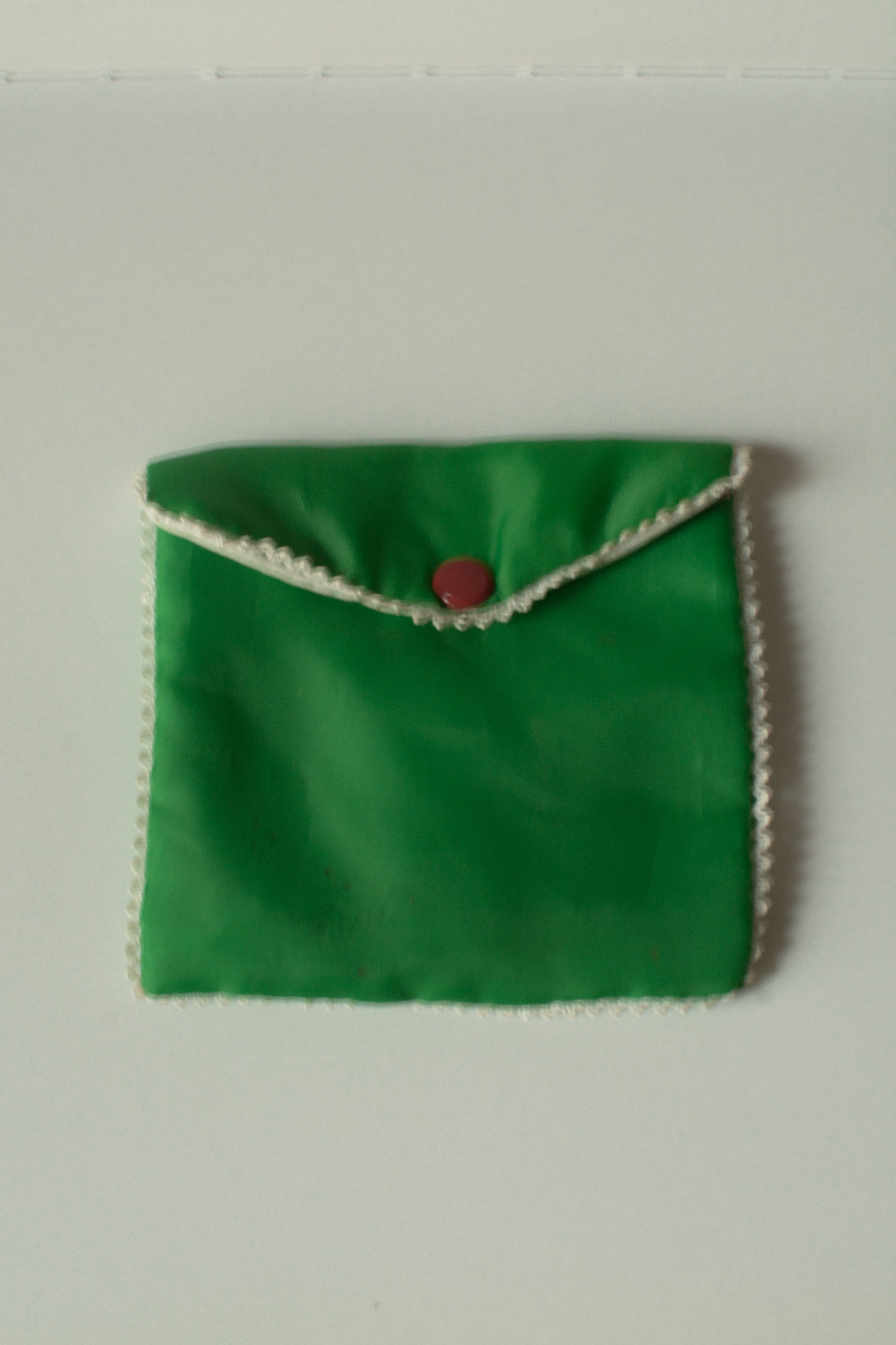 Vintage Green Fabric porch with Red Button