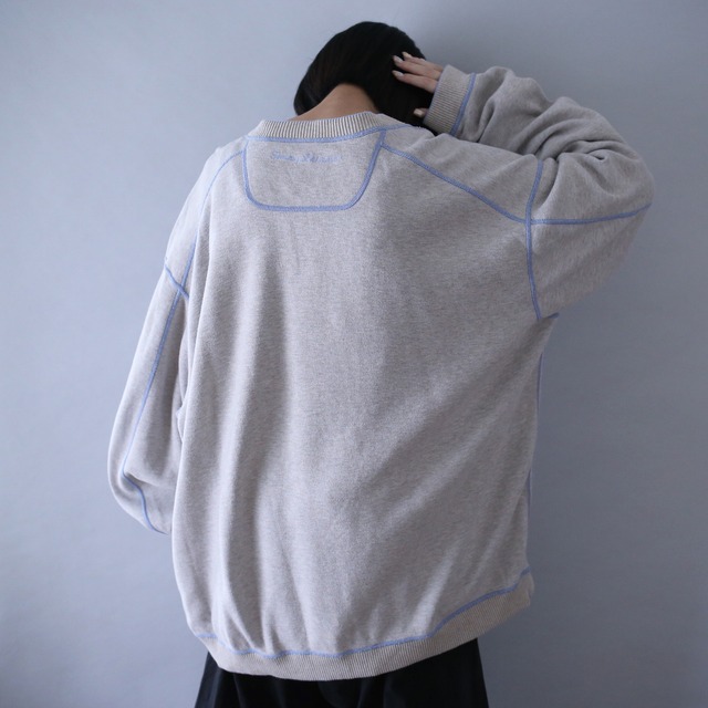 "2-way" stitch work design over silhouette sweat