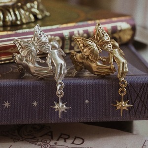 brass ring of spherically-articulated dolls