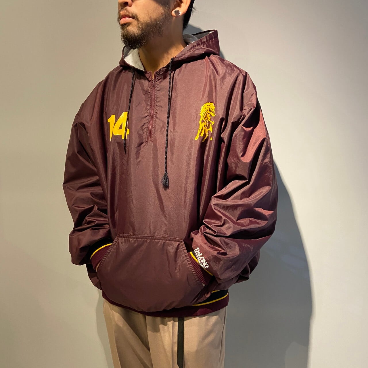 ナイロンプルオーバージャケット メンズ2XL 相当 古着 カレッジ