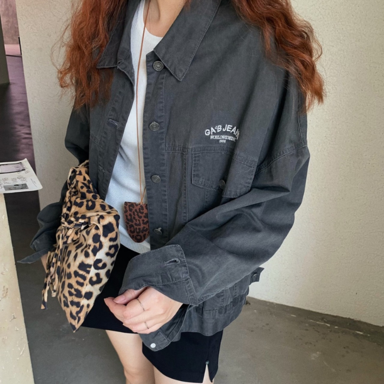 embroidered logo over jacket J00019