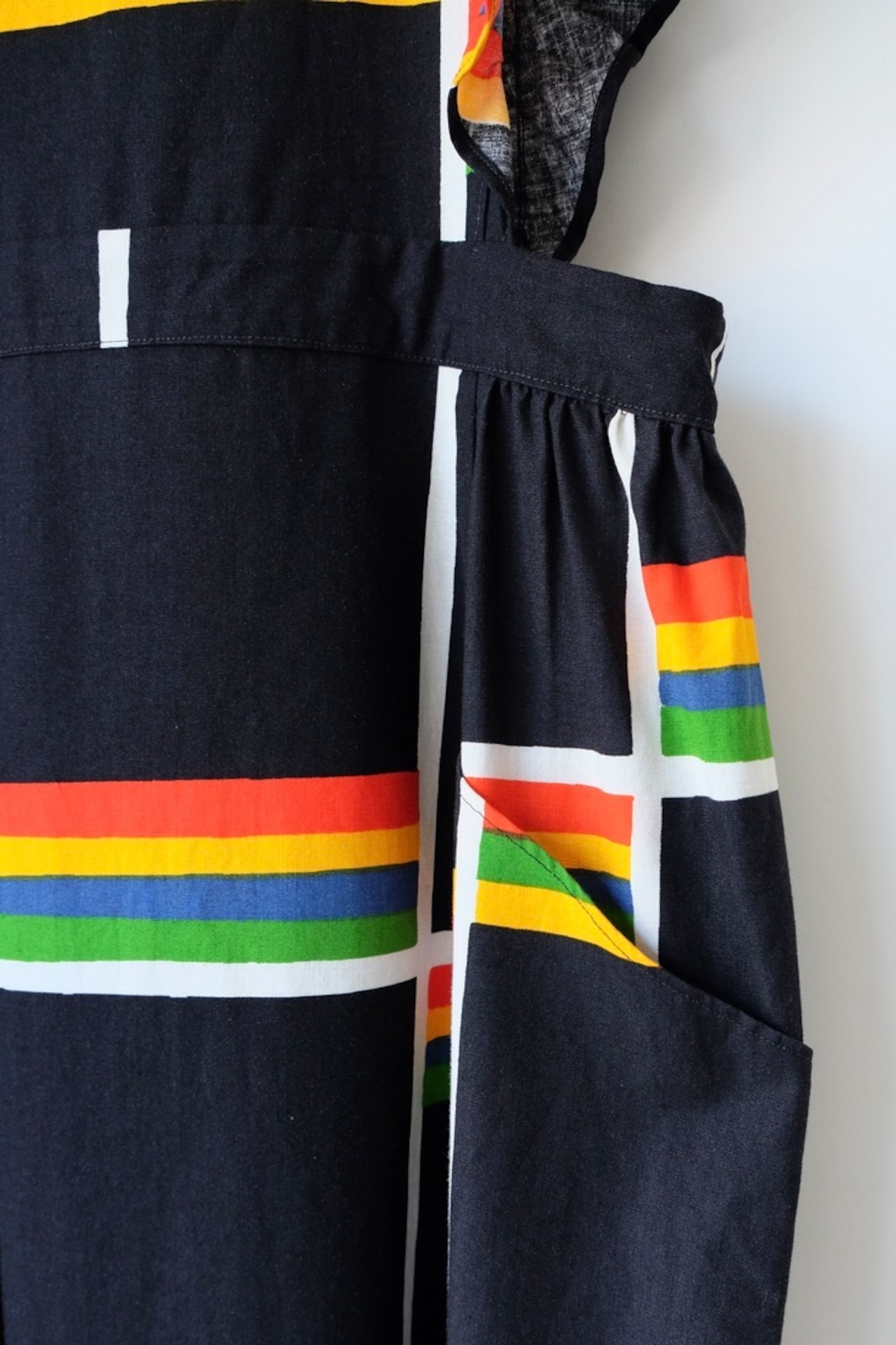 Black rainbow apron dress