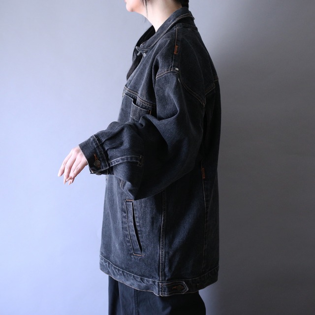 good fade over silhouette black denim jacket