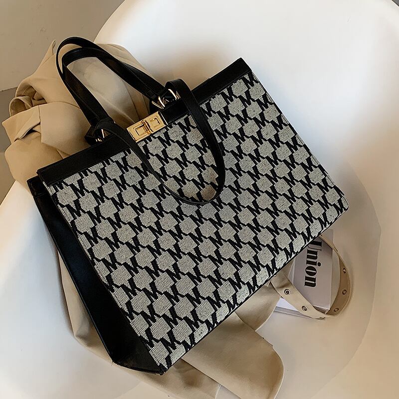 レディースワンショルダービッグバッグメスバッグ2020新しいトレンディなネットレッドワイルドイン大容量ポータブルトートバッグ Tiancai_Wing_Bag52285385564