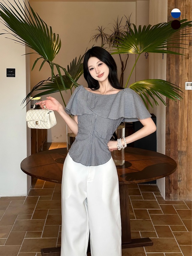 バックボタンフレアケープルックショルダートップス