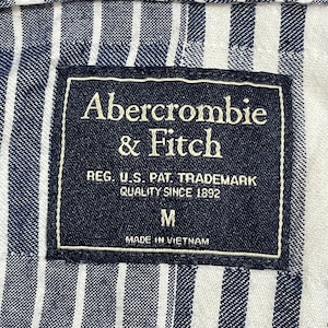 【Abercrombie & Fitch】半袖シャツシルク 柄ボーダー ストライプ 総柄 柄物 ボタンダウン オールパターン アバクロ M US古着