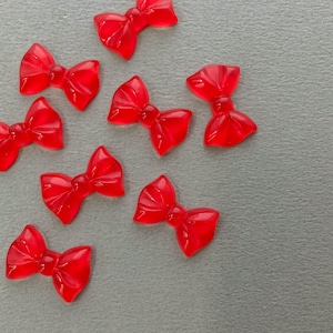 〈再入荷〉クリア赤ぷっくりリボンカボション