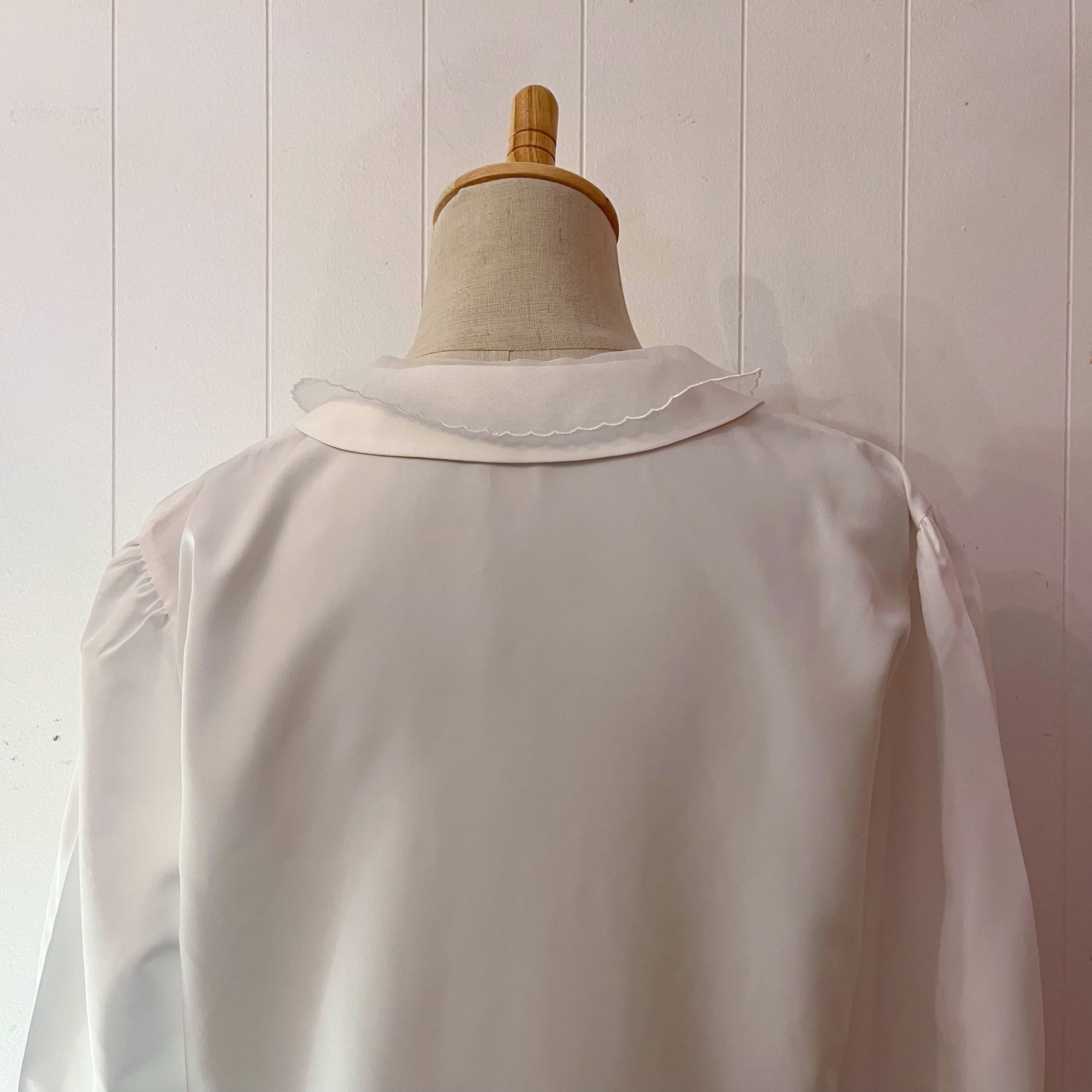 ribbon brooch white blouse