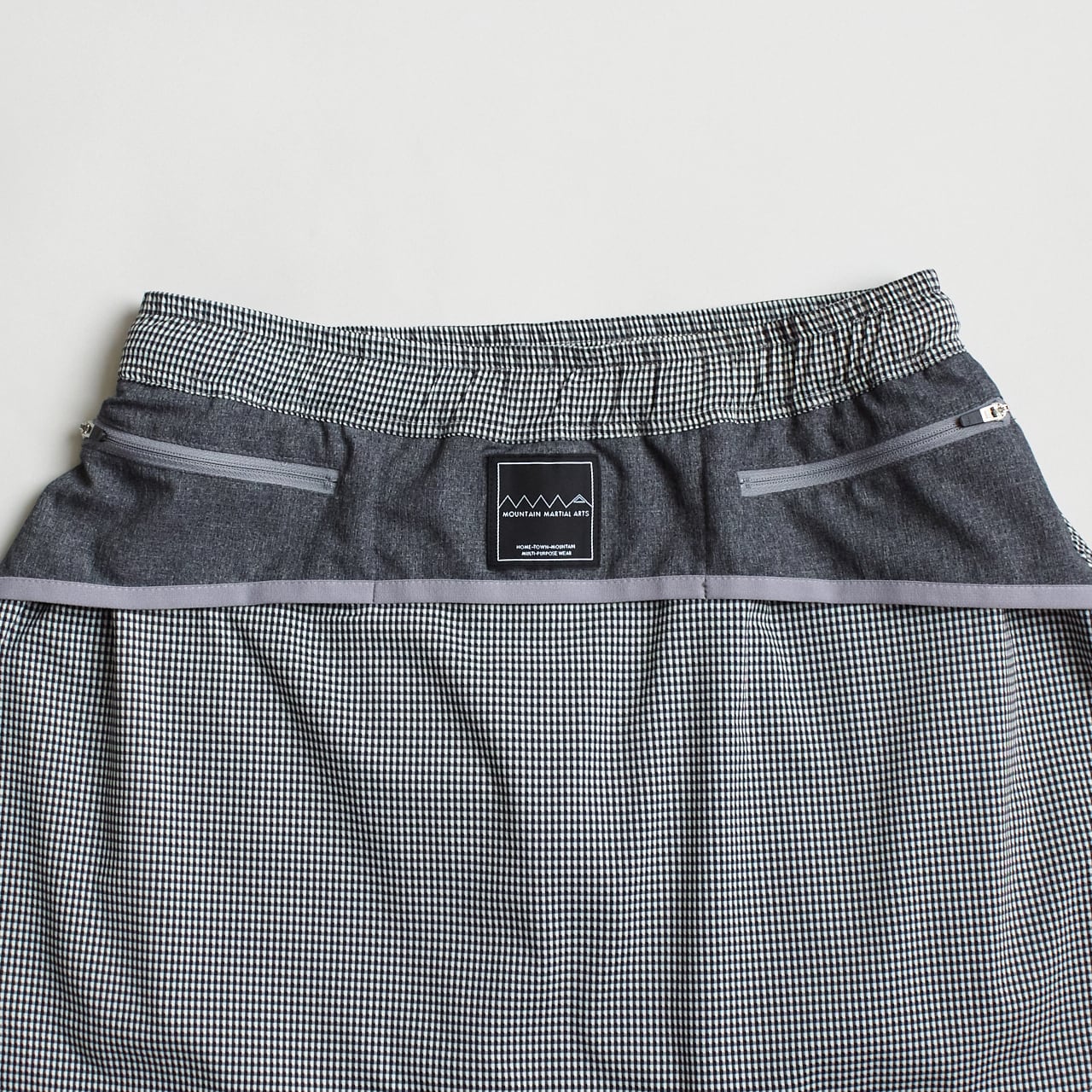 MMA（マウンテンマーシャルアーツ）MMA Front Pleats Run Skirt -Gray