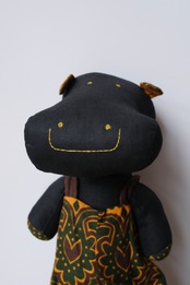 Handmade stuffed smiley hippo