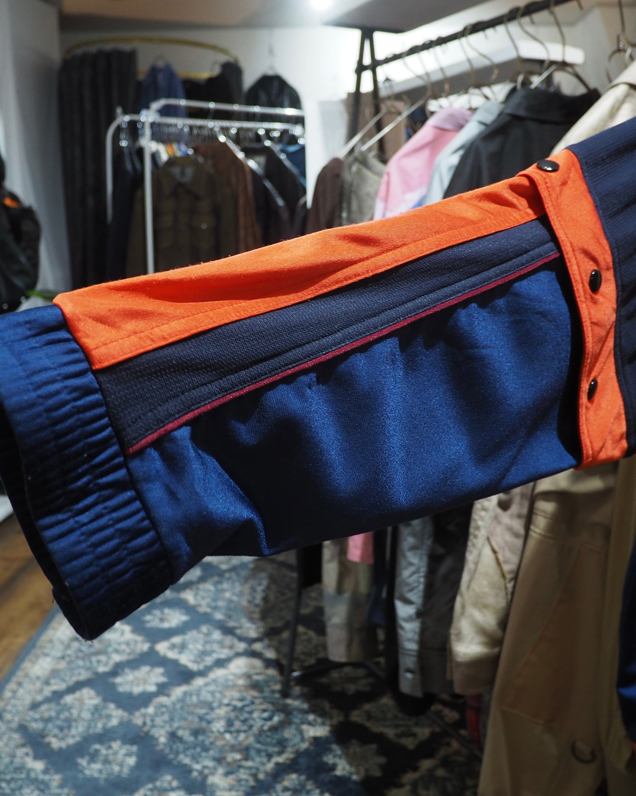 1990s " UMBRO " Vivid Orange × Dark Navy Switching Panel Vintage Loose Track Jacket
