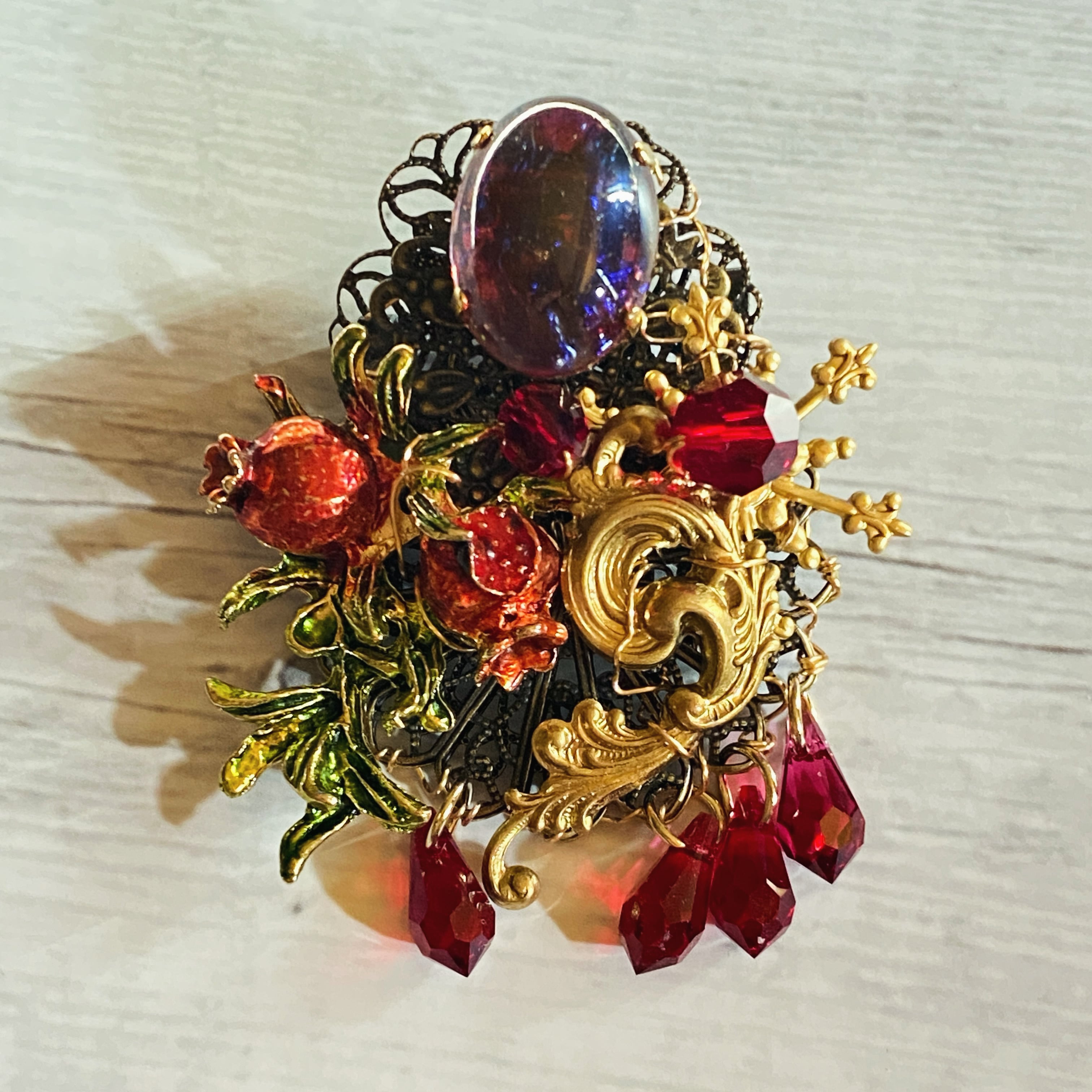 柘榴に落ちる蒼い火