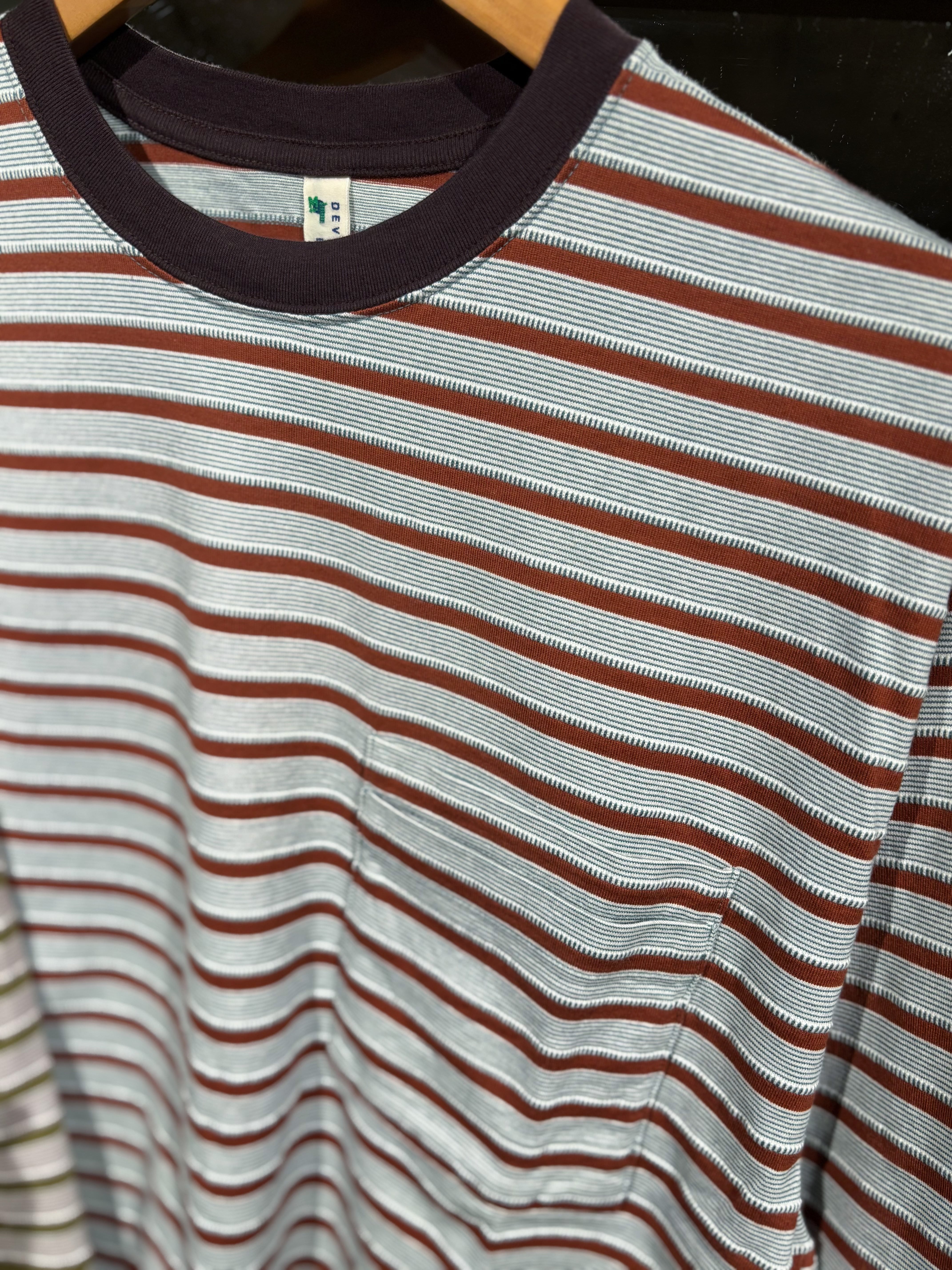 NOROLL UNEVENNESS L/S TEE GREEN ORANGE / ノーロール Tシャツ