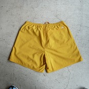 new balance ナイロンイージーショーツ イエロー