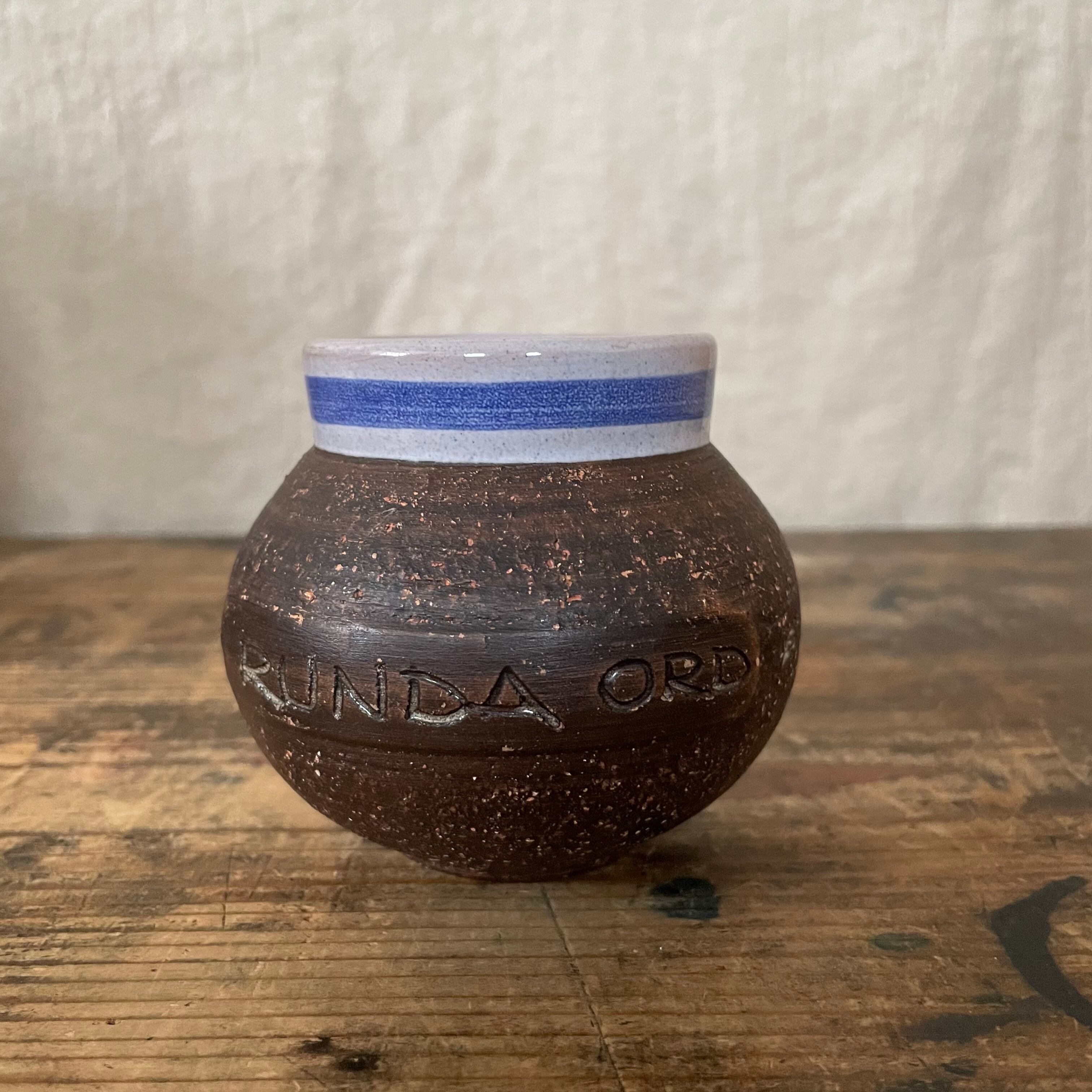 青いラインの丸いツボ