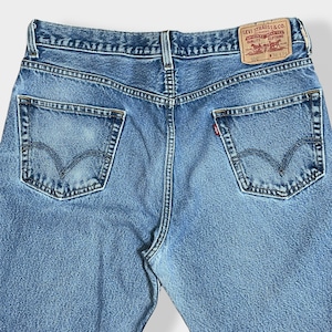 【LEVI'S】550 ジーンズ デニム ジーパン ワイドテーパード ジッパーフライ W36 L34 リーバイス ルーズ ダボパン ダメージ ジーンズ RELAXED FIT レソト製 US古着