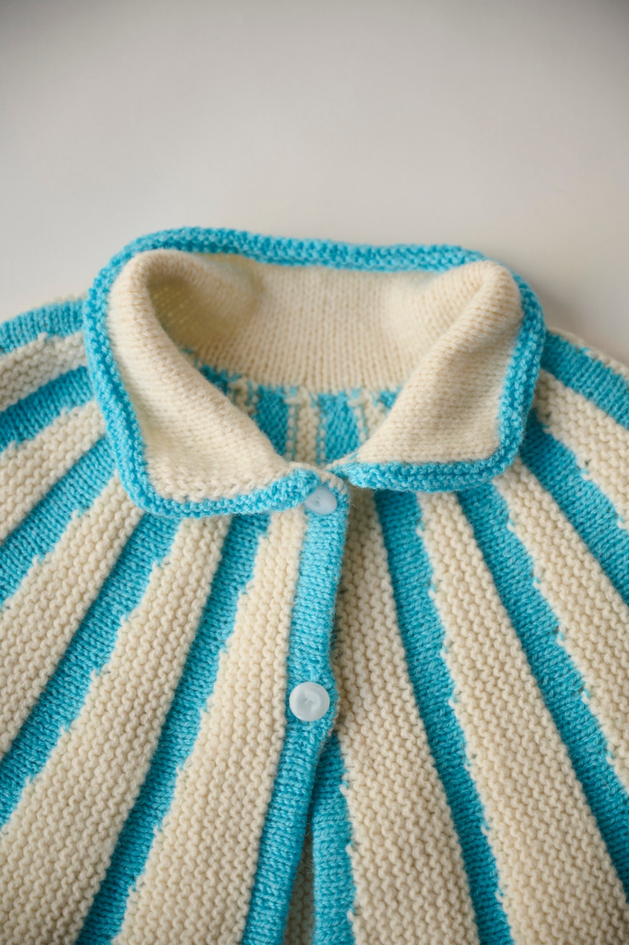 Candy stripe knit cape