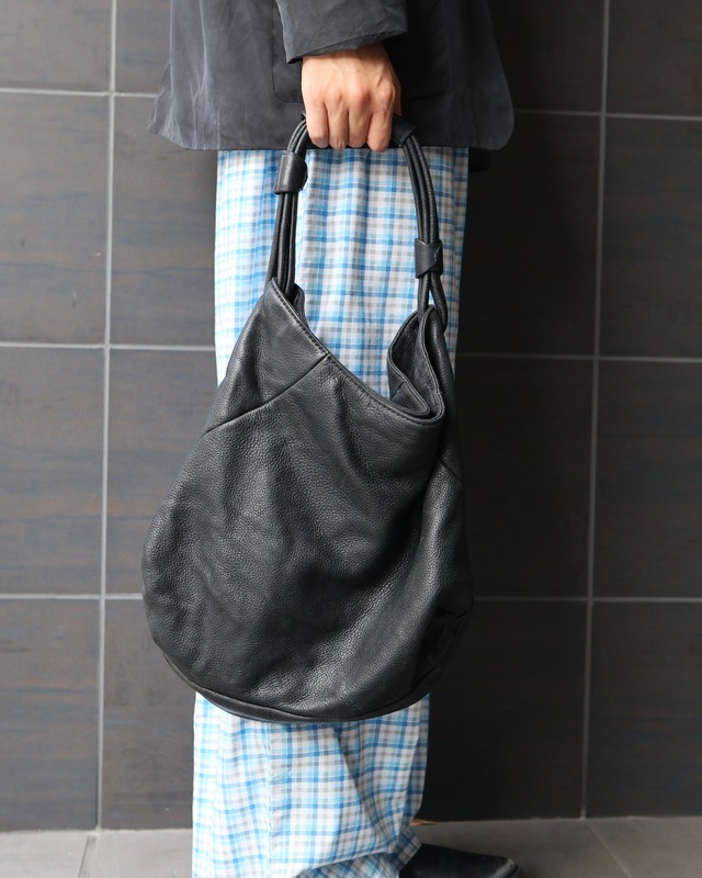 Side detail shoulder bag