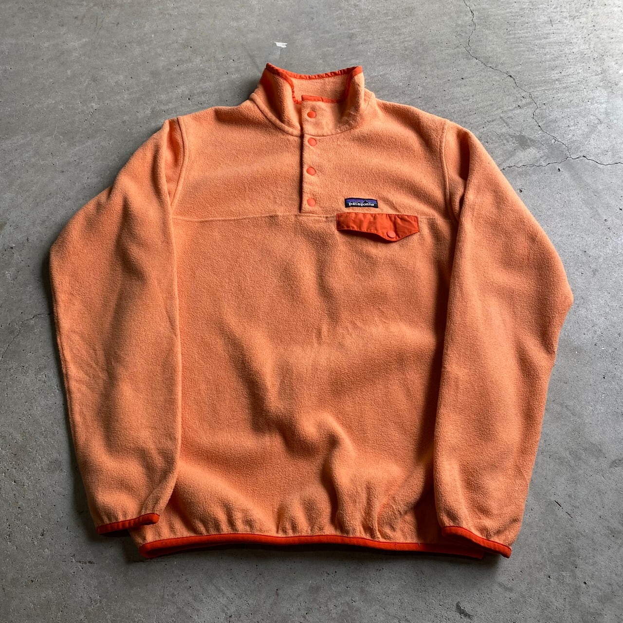 15年製 パタゴニア スナップT シンチラ フリースプルオーバー レディースM 古着 Patagonia アウトドア  オレンジ【アウトドアジャケット】【WS2202-30】【SOL】 | cave 古着屋【公式】古着通販サイト