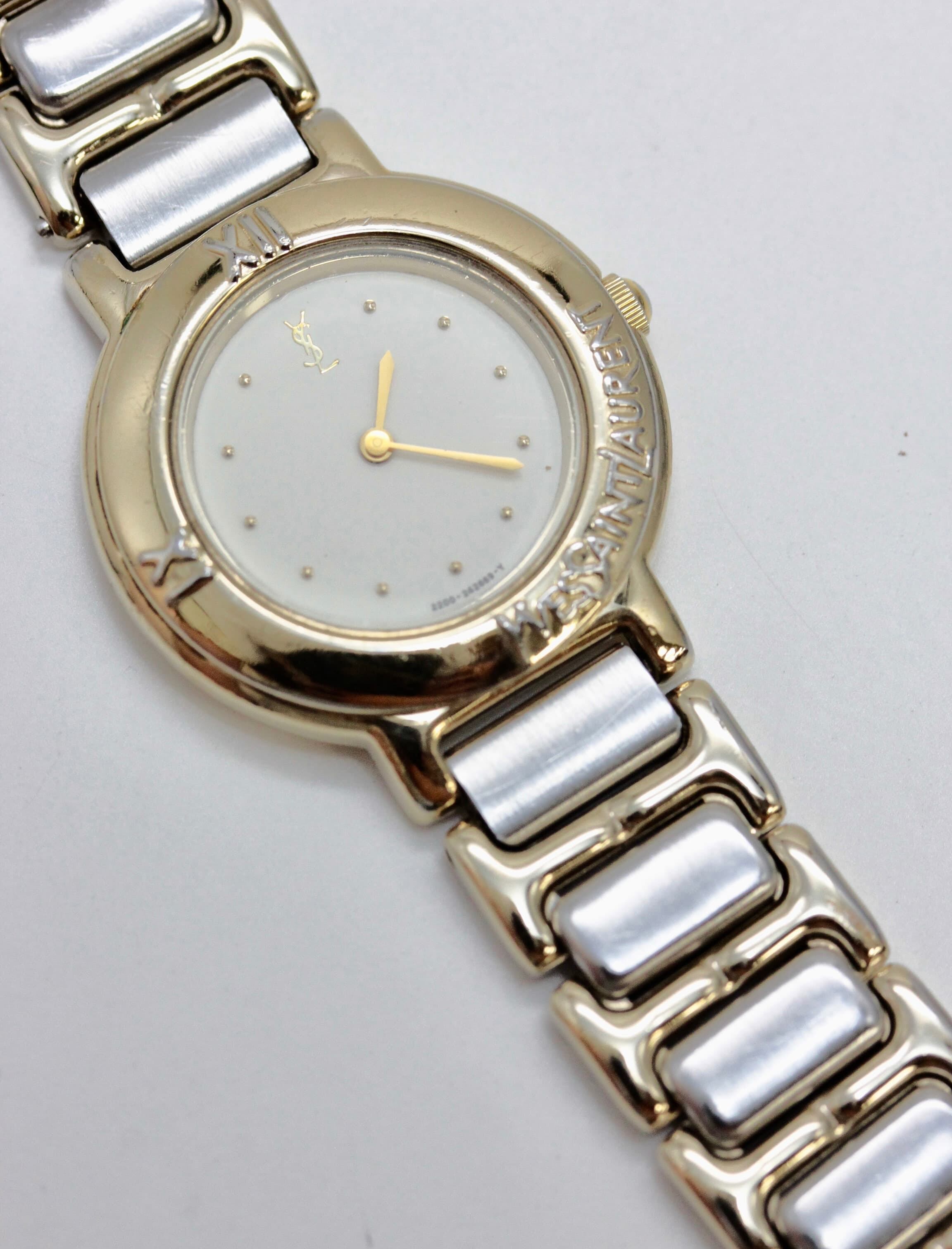 YvesSaintLauren(イブサンローラン) ゴールド×シルバー ヴィンテージ腕時計 リリアルロン ririalerond