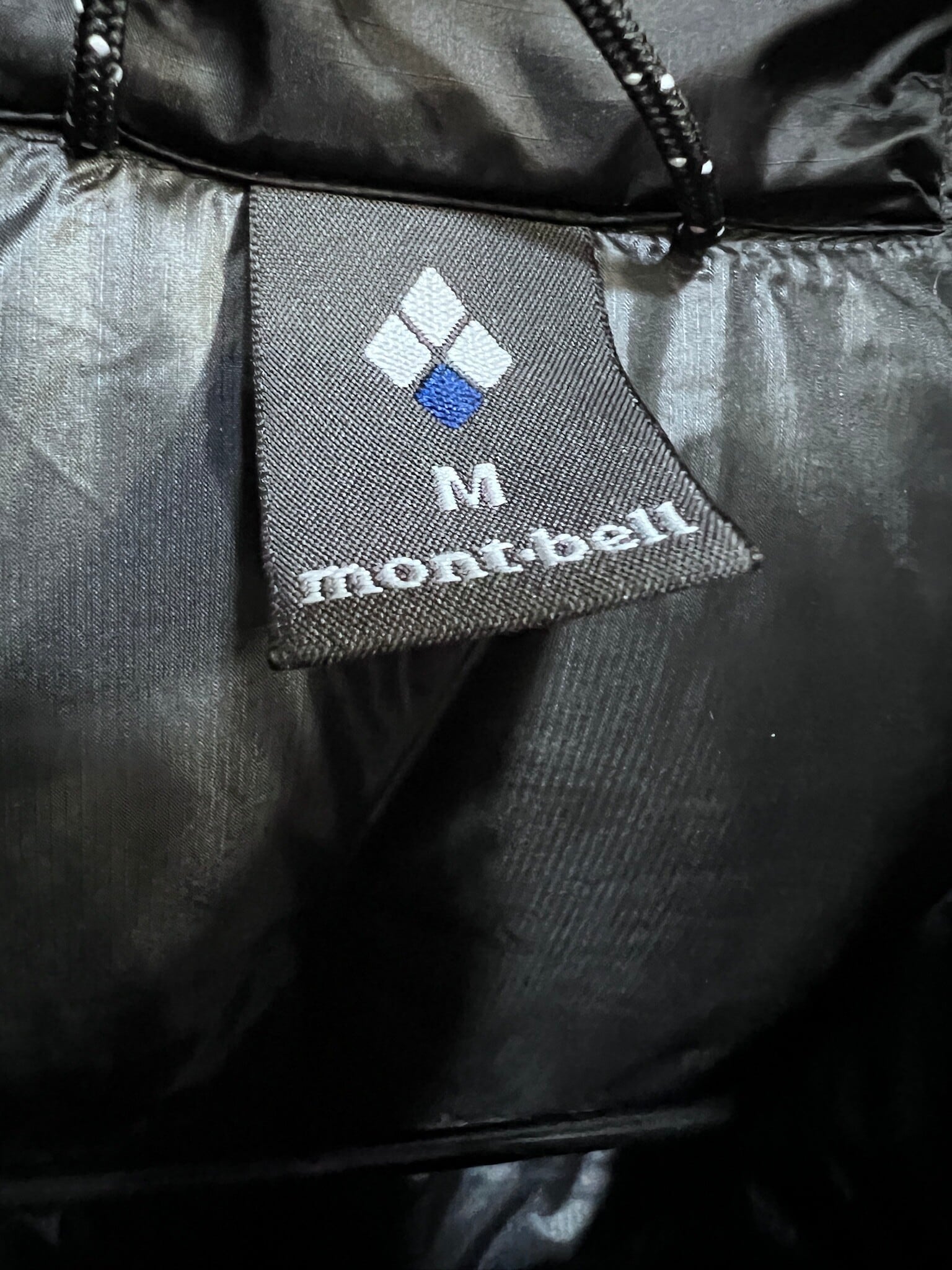 美品 モンベル スペリオダウンベスト M ブラック mont-bell 1101663