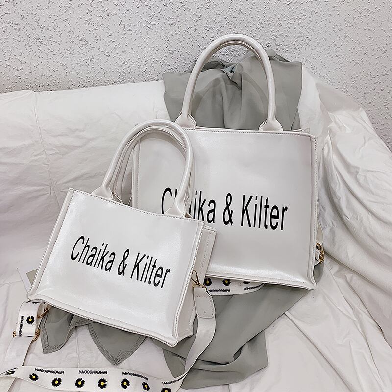 バッグレディースバッグ大容量2020夏ニューウェーブファッションワイルドブロードバンドショルダーバッグエインガスネットレッドトートバッグ Tiancai_Wing_Bag6551177