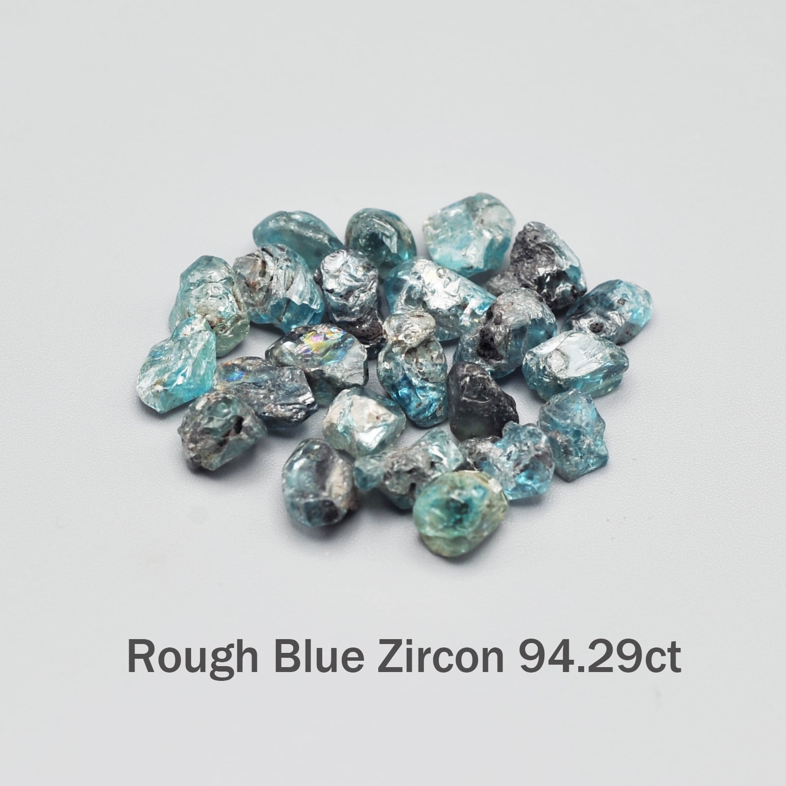 カンボジア産】ナチュラル グリーンブルージルコン原石 94.29ct（23個