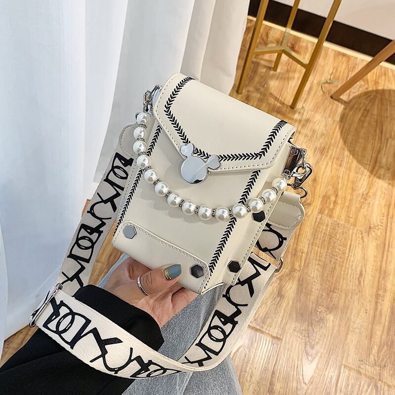 ニッチデザインバッグレディース2020人気の新しいトレンディなファッションオールマッチメッセンジャーバッグバージョンのネットレッドパールバケットバッグ Tiancai_Wing_Bag1840204