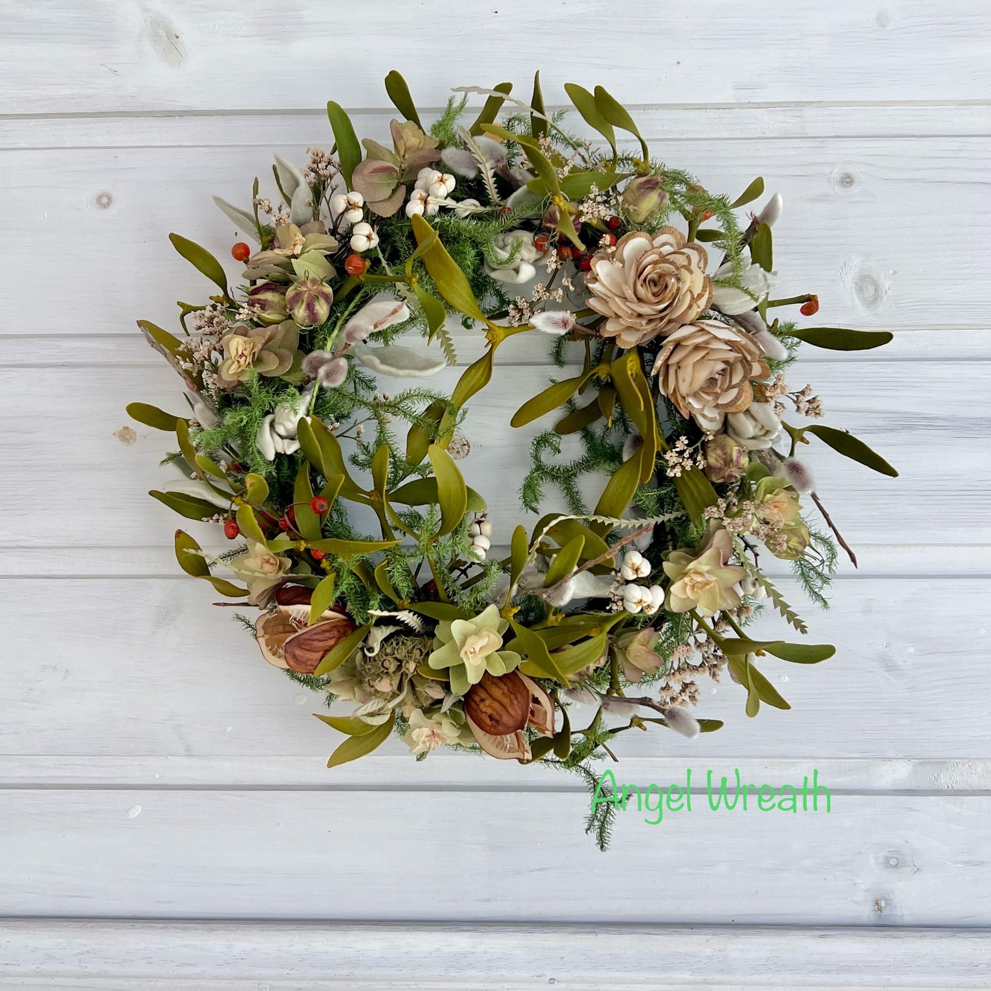 クリスマスを彩るヤドリギのハーフリース クリスマスを彩るヤドリギのハーフリース