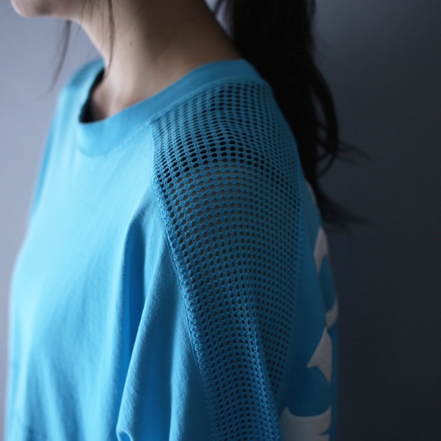 shoulder and sleeve switching mesh design back printed over silhouette souvenir l/s tee
