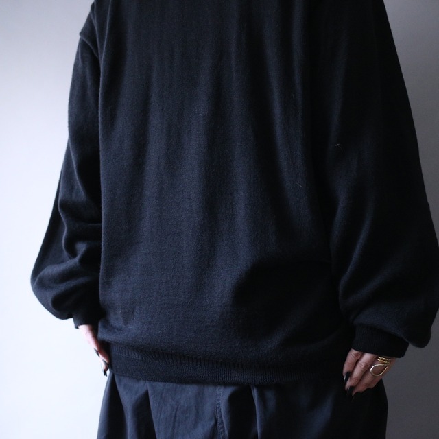 fake leather taping design over silhouette sweater