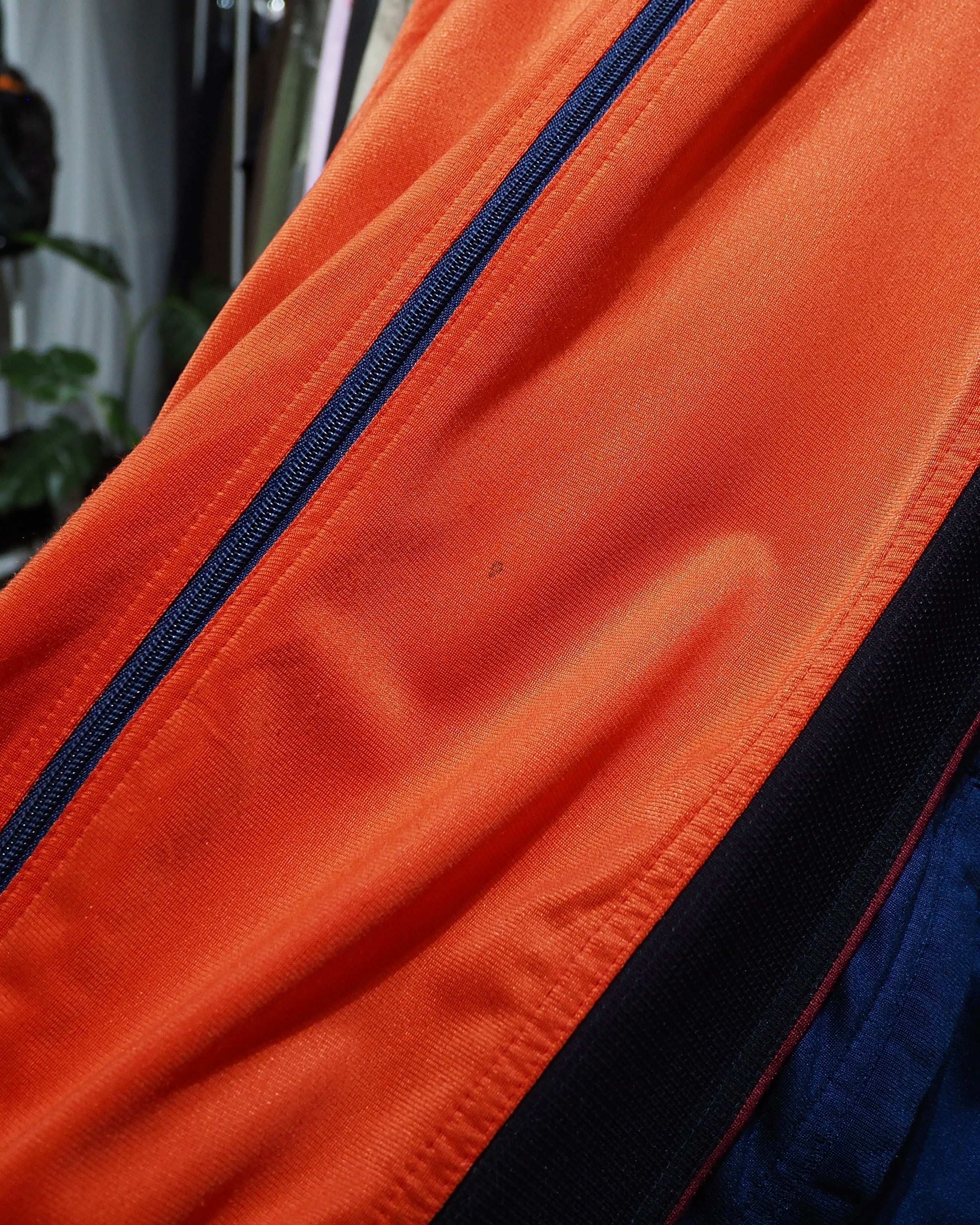 1990s " UMBRO " Vivid Orange × Dark Navy Switching Panel Vintage Loose Track Jacket