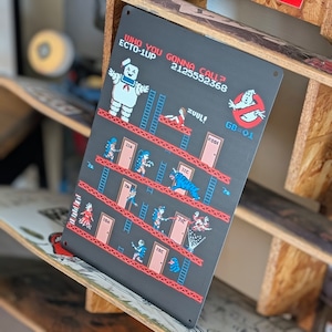 送料無料!ちょうどいいブリキ看板 【 GHOSTBUSTERS / ゴーストバスターズ 】 マシュマロマン / METAL SIGN / メタルサイン / ブリキ看板 / サインボード / ビンテージ加工〚アメリカン雑貨 アメトイ〛