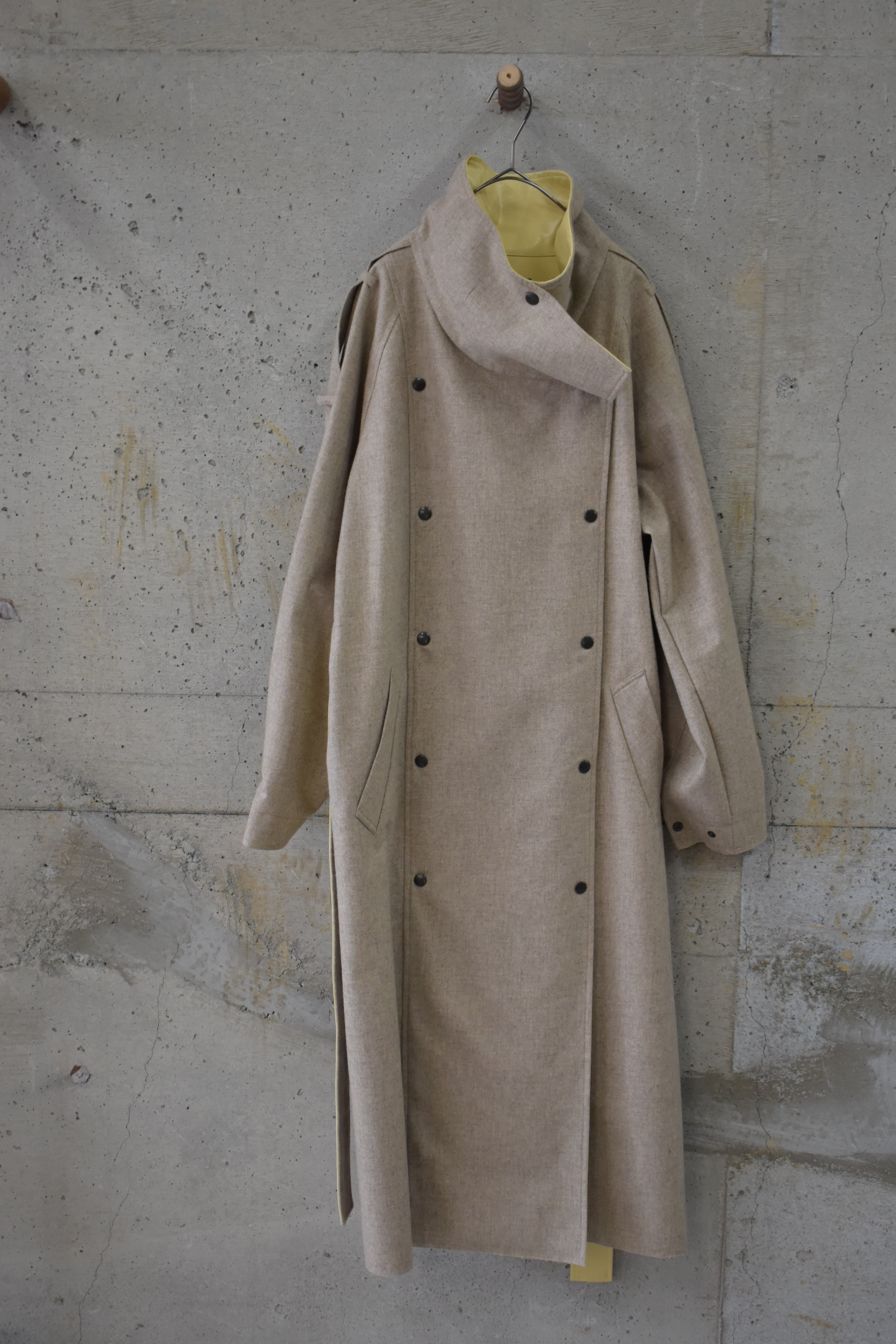 Long coat with a beige, coated lining