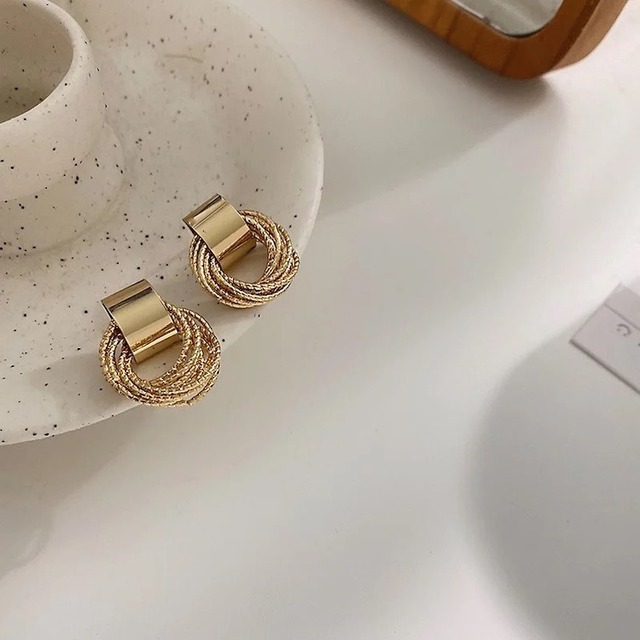 gold ring overlap pierce