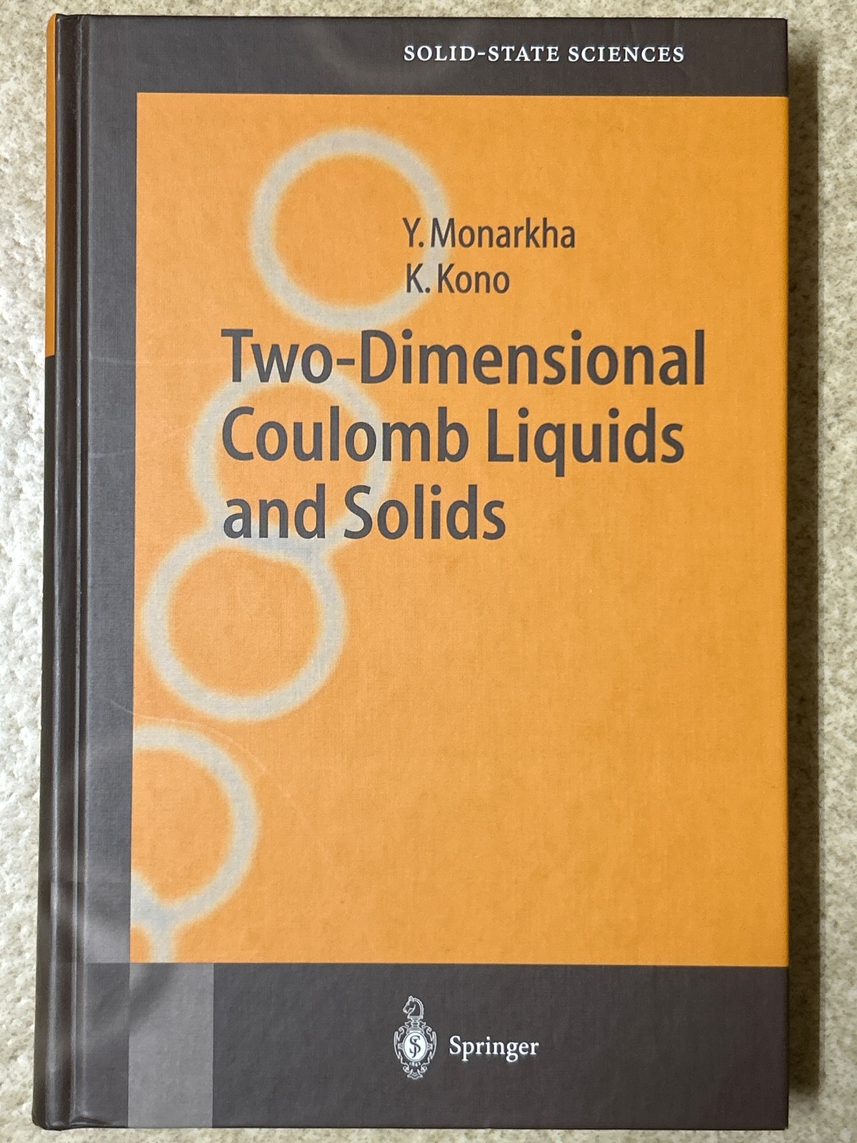 Two-Dimensional Coulomb Liquids and Solids. (Springer Series in Solid ...