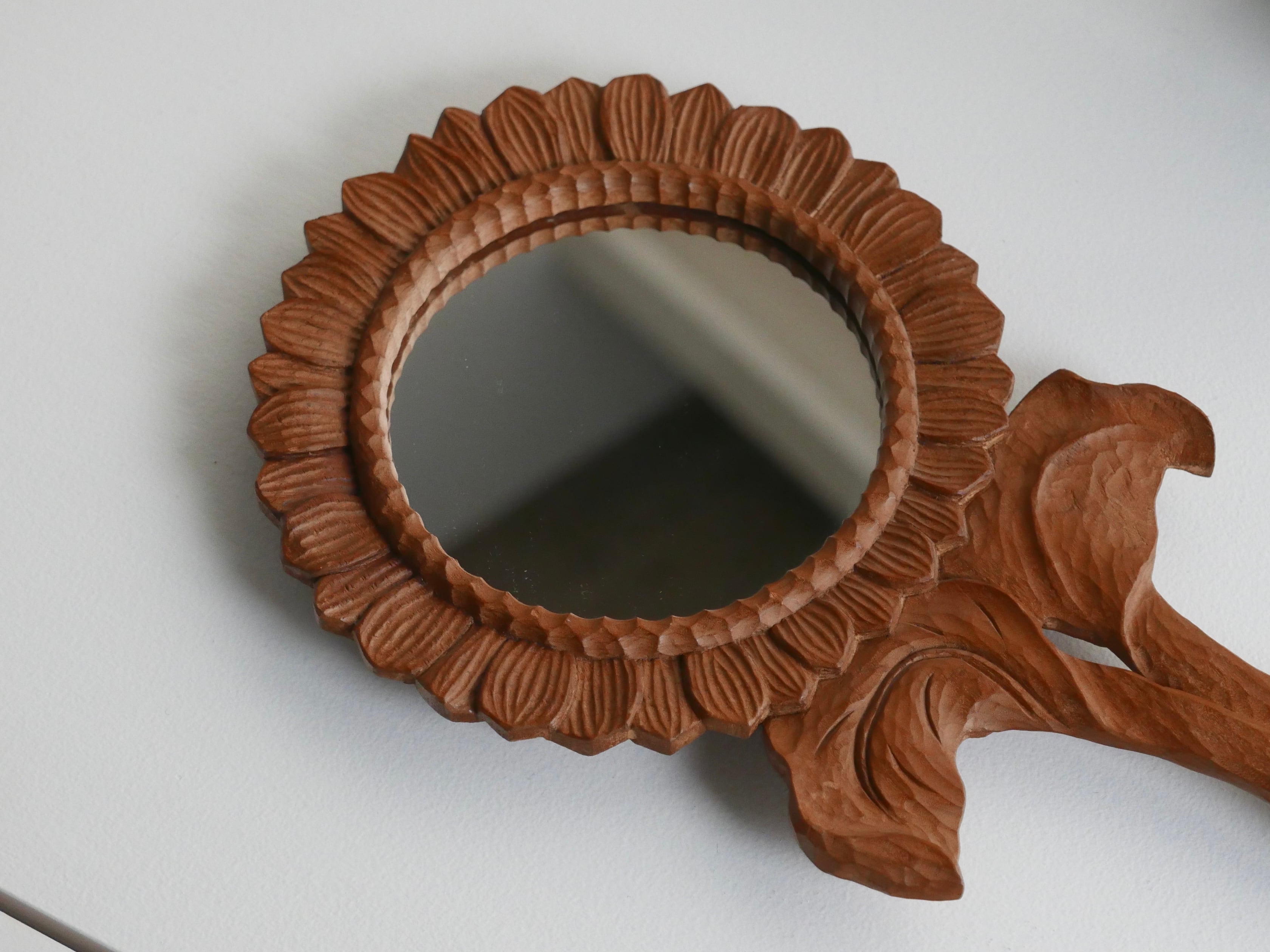 carved hand mirror , sunflower