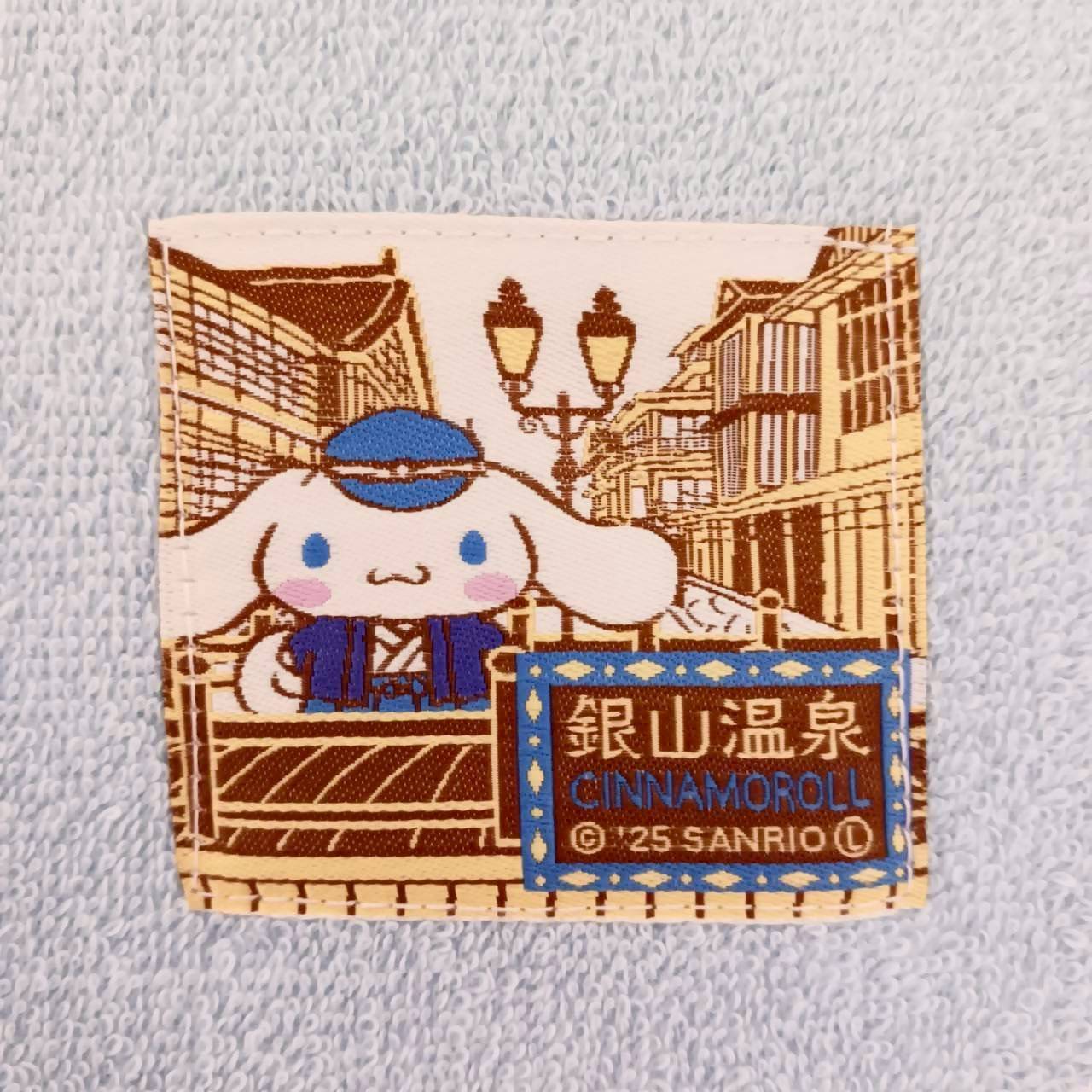シナモロール山形 銀山温泉 織ネームタオル | TORCH-Online Shop-