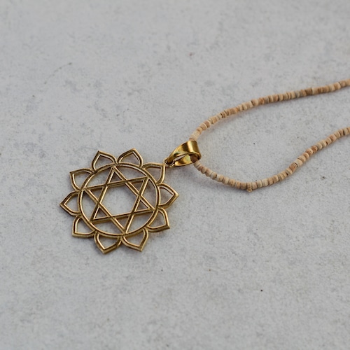 Sun Star Motif Sandalwood Necklace