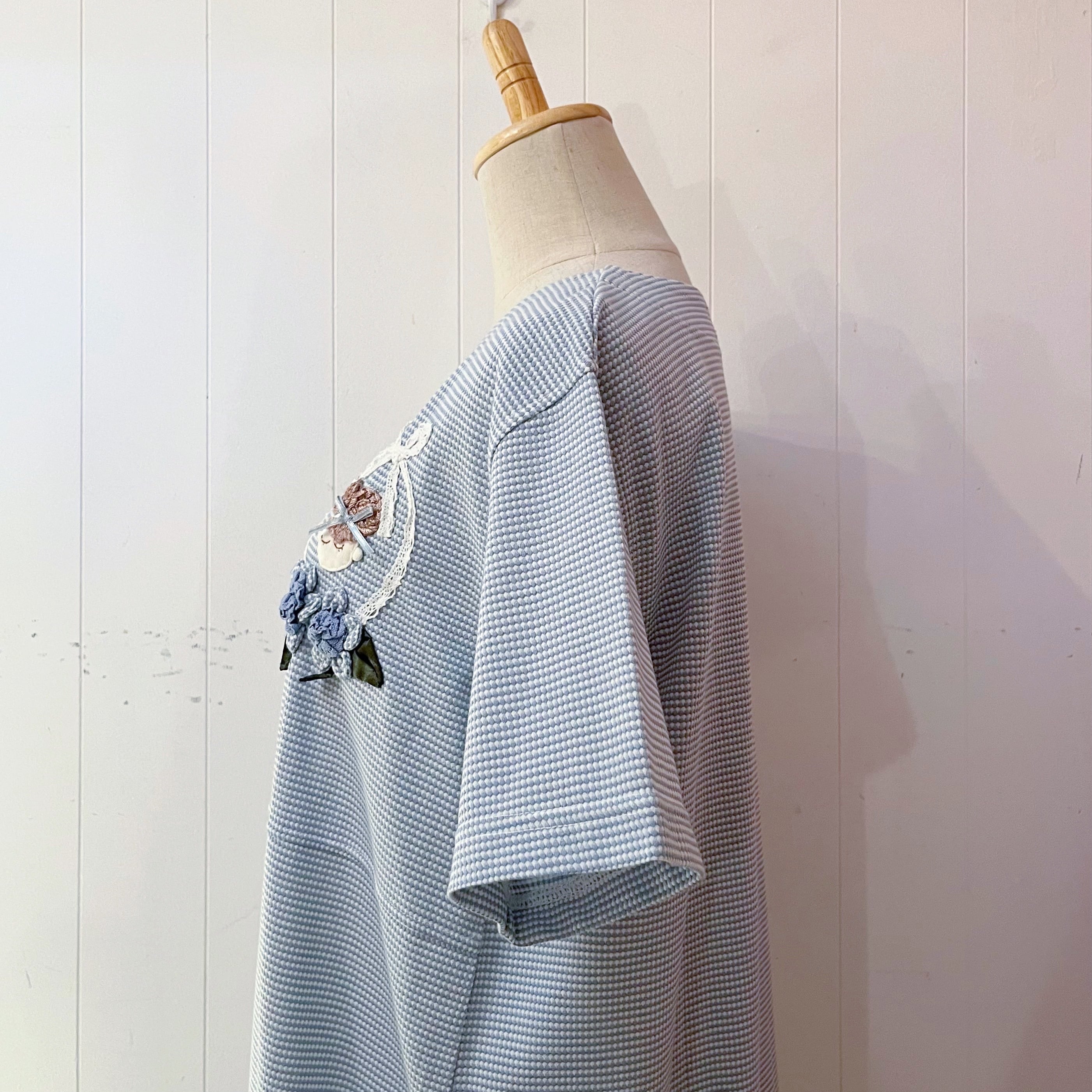 doll applique light blue one-piece