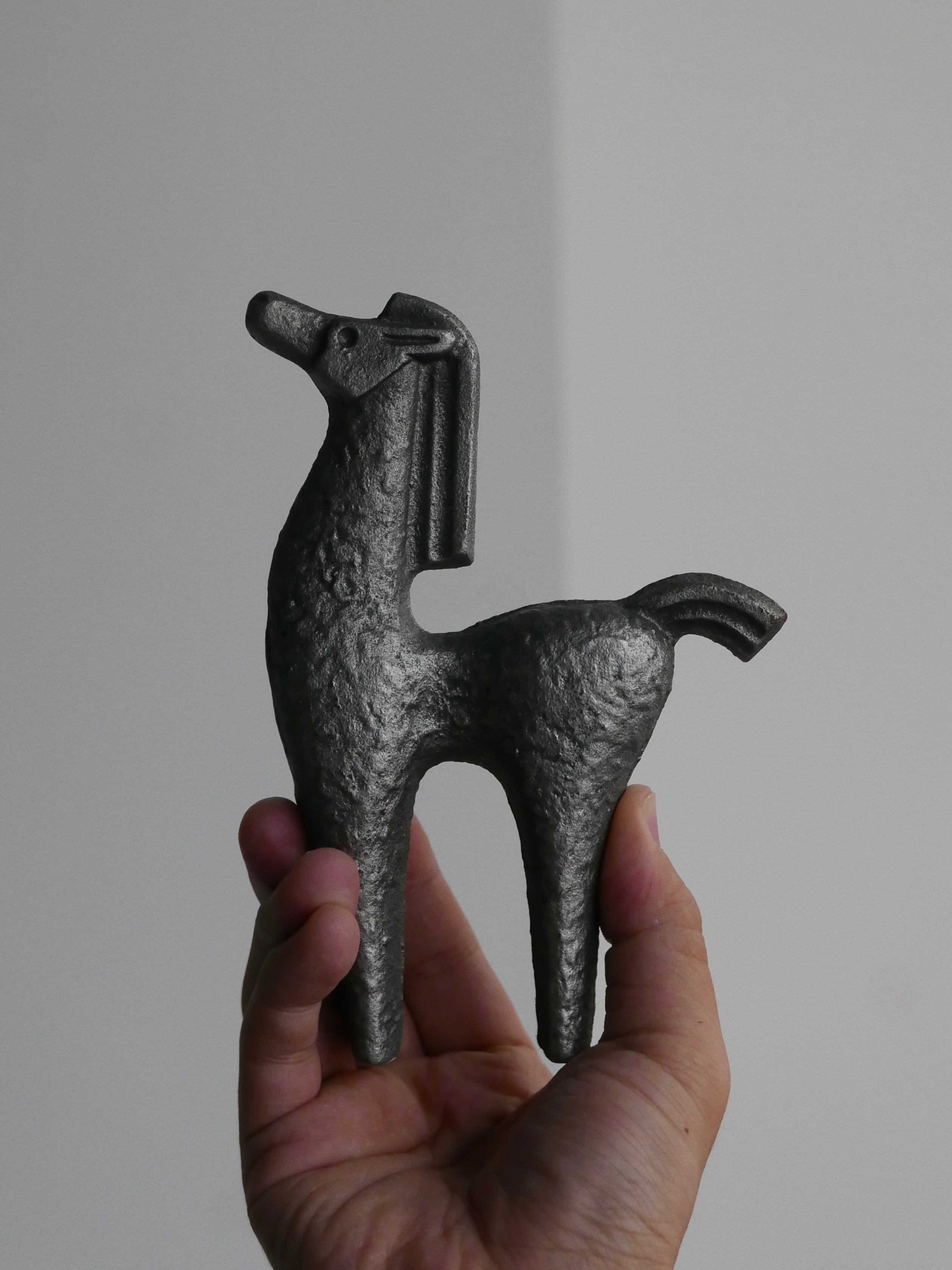 old cast iron object " minimal horse "