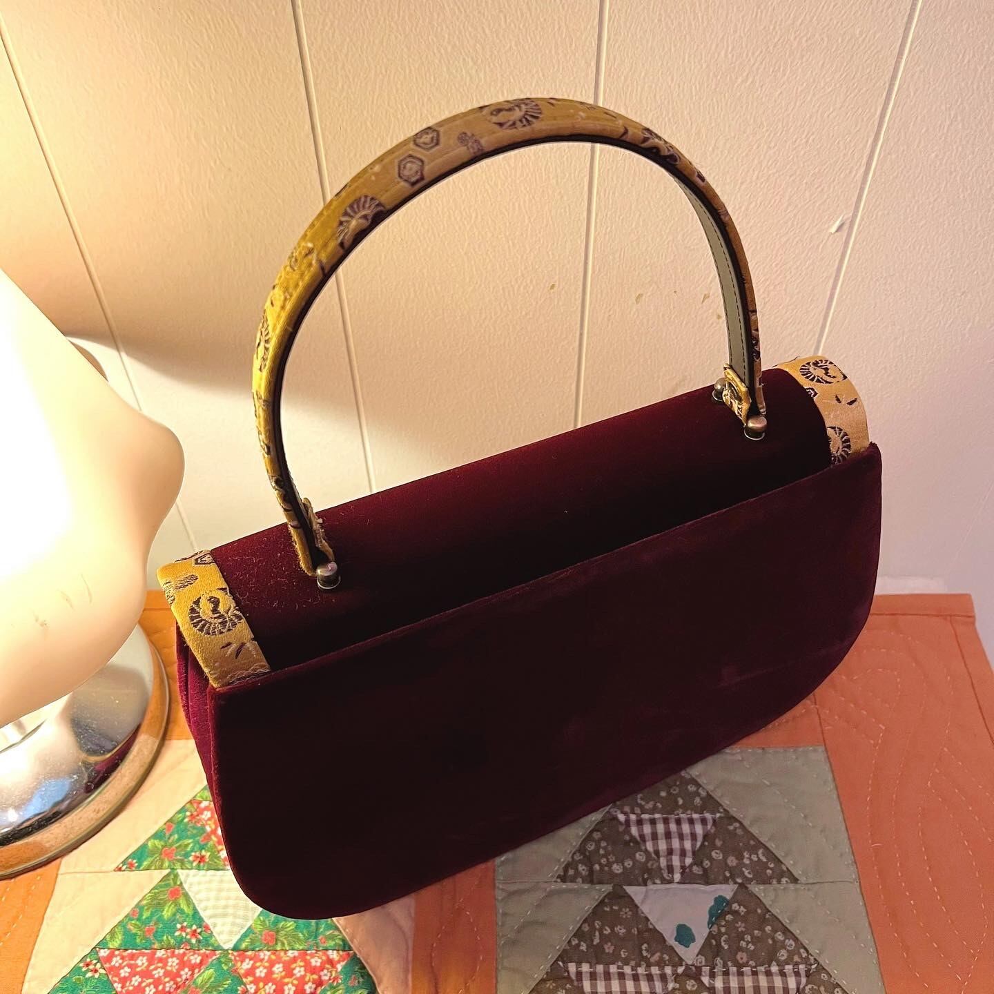 bordeaux ellipse hand bag