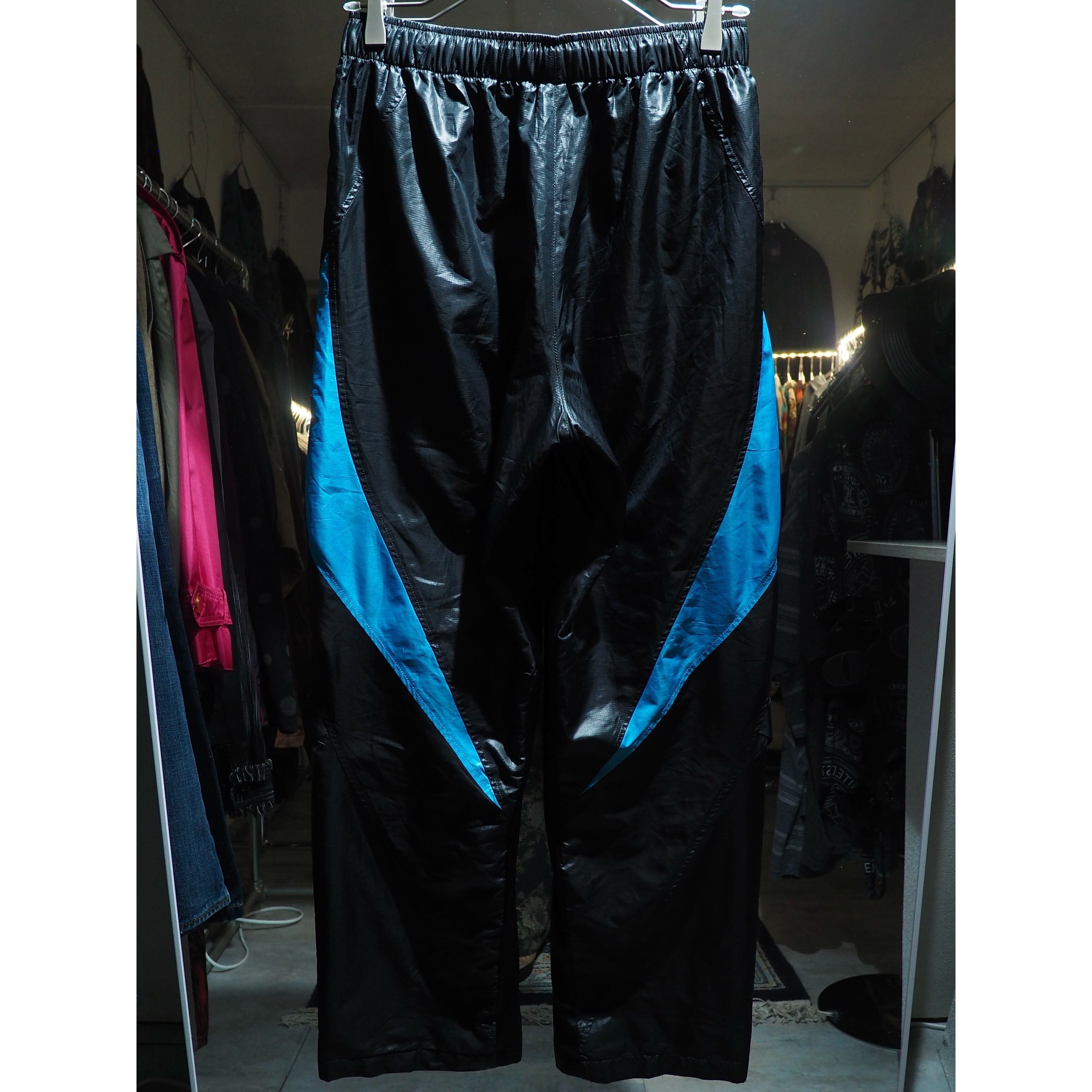 Dark Pink × Neon Blue color panel Switching Cyber track pants